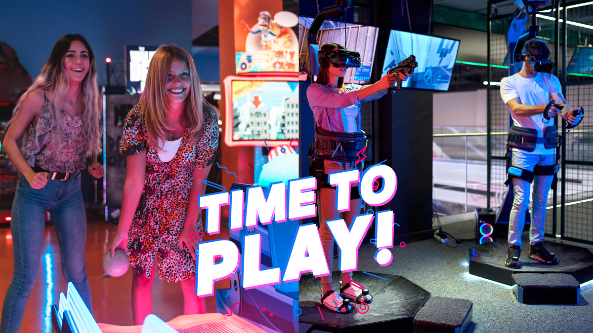 happy-women-playing-arcade-game